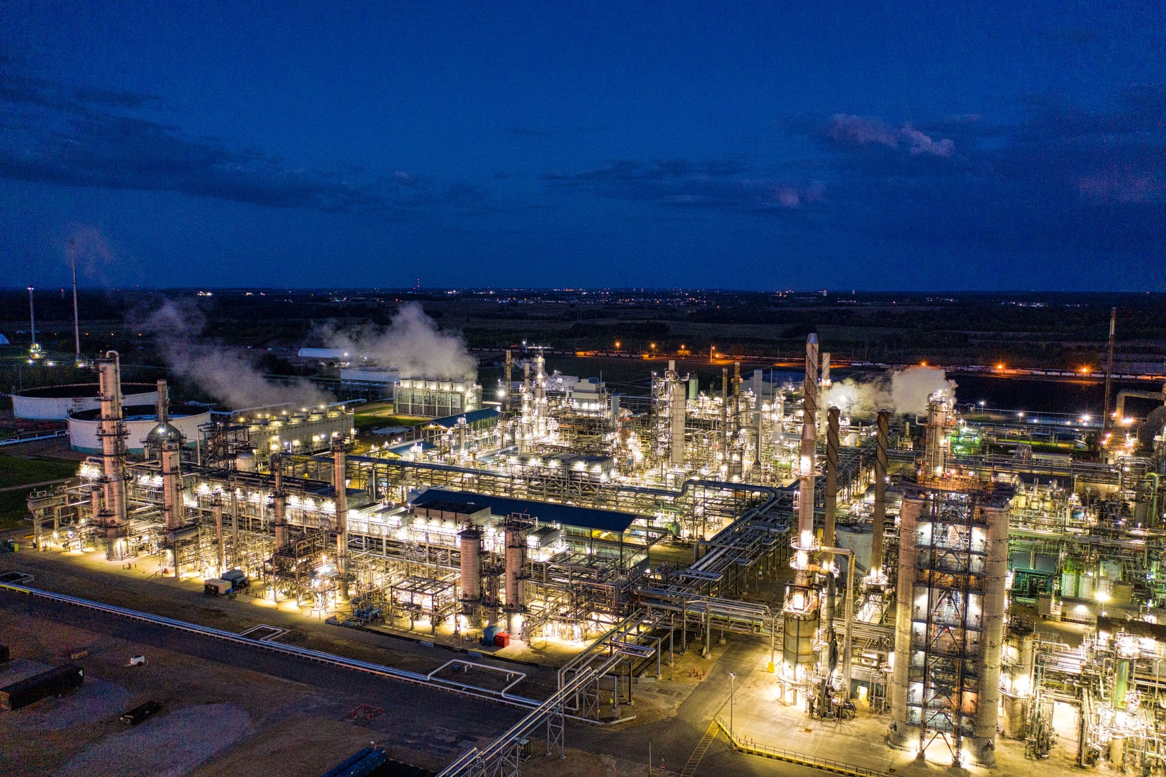 Refinery lit up at dusk