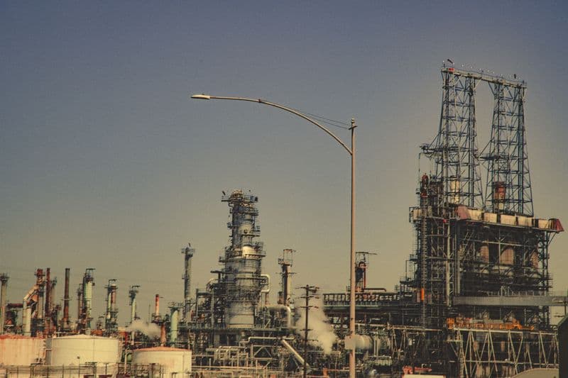 Refinery towers at dusk