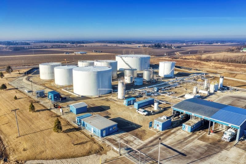 Aerial view of a manufacturing plant with storage tanks